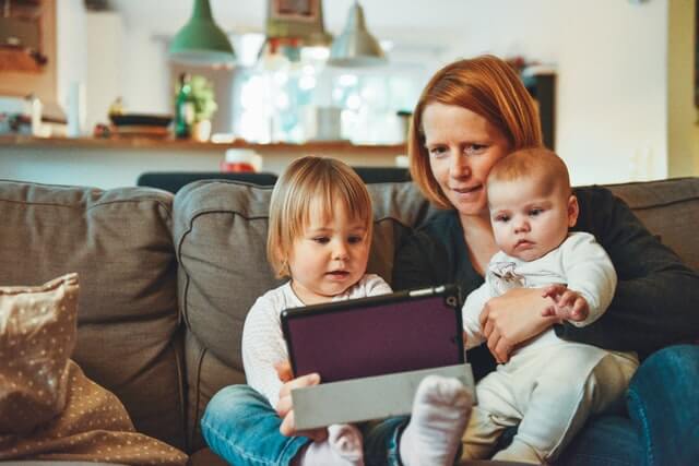 mom anxiety-mother sitting with her two children