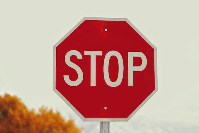 red stop sign used as symbol to stop overanalyzing social interactions