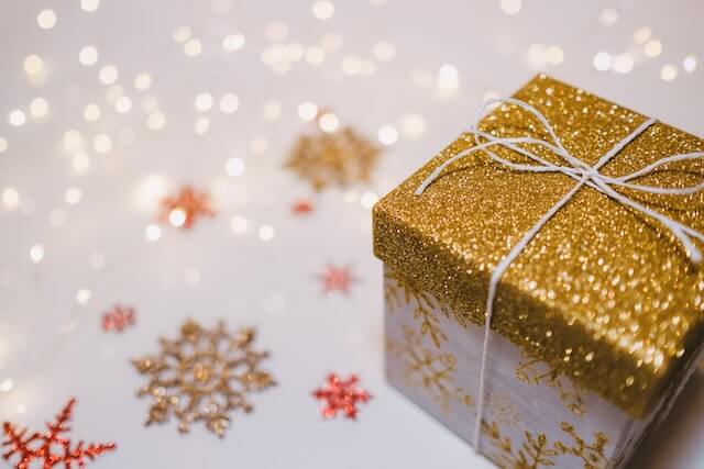 social anxiety and the holidays-gift box with gold top and glitter