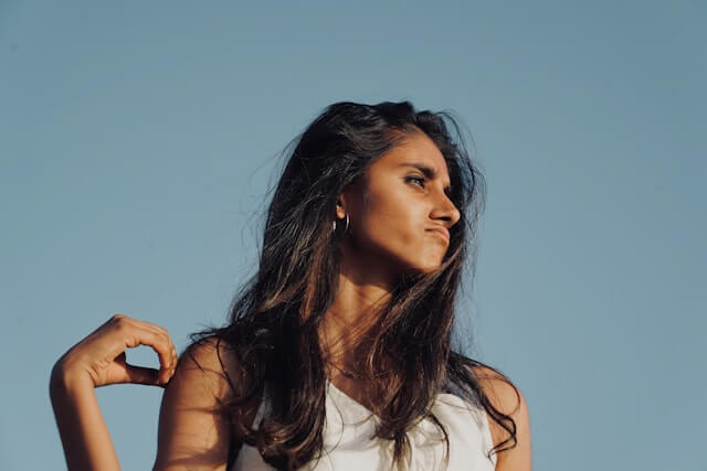 Young adult woman engaging in mental preparation