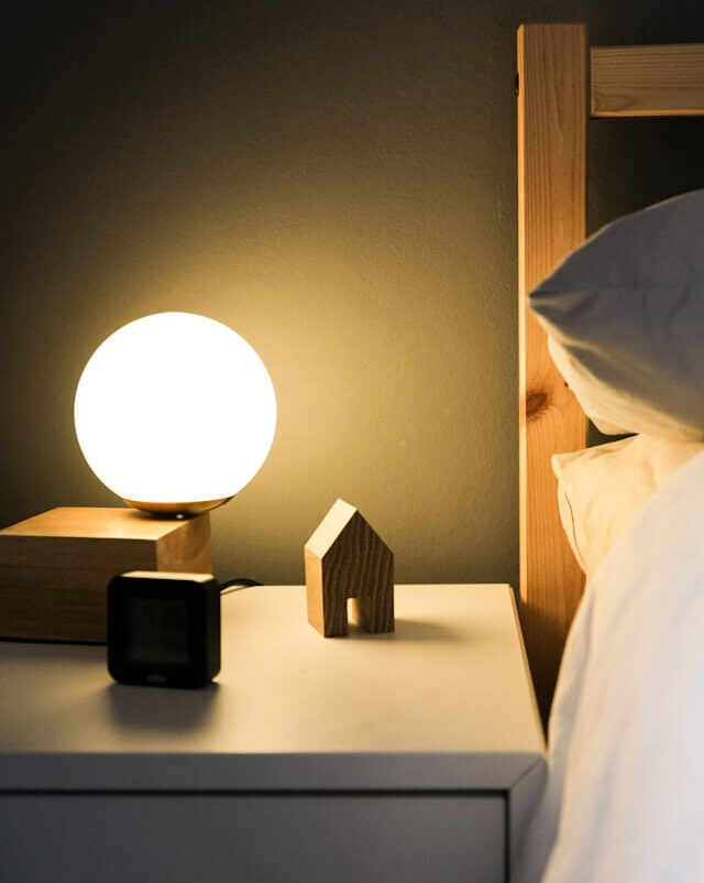 bed and nightstand table dealing with anticipatory anxiety